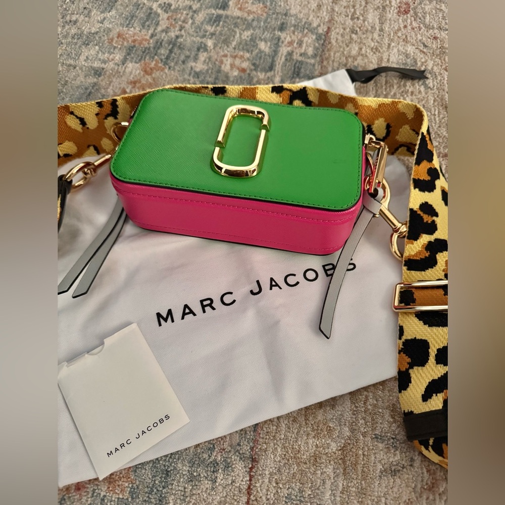 Marc Jacob’s camera bag in jade and pink with leopard adjustable strap